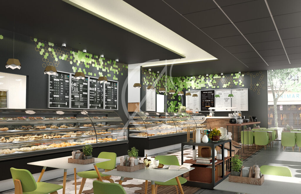A modern bakery café with display counters filled with pastries and green-themed seating.