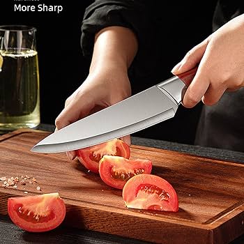 Chef using separate knives for meat and vegetables to prevent cross-contamination in the kitchen.
