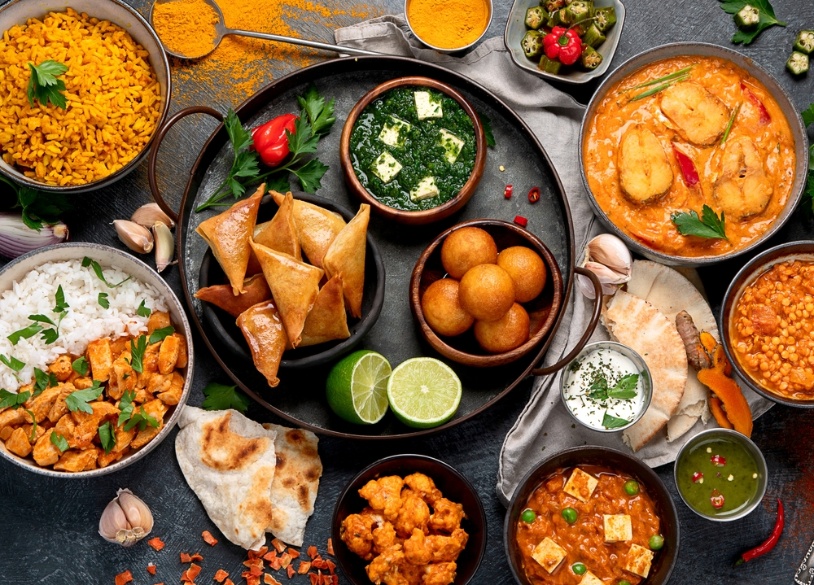 a top view of indian food served at a restaurant in phuket bangalore