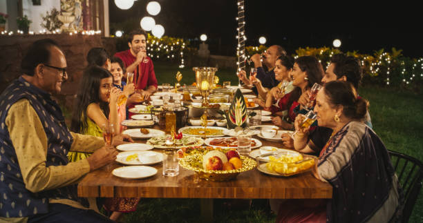 Family enjoying a festive feast together at a restaurant with dishes for all ages.
