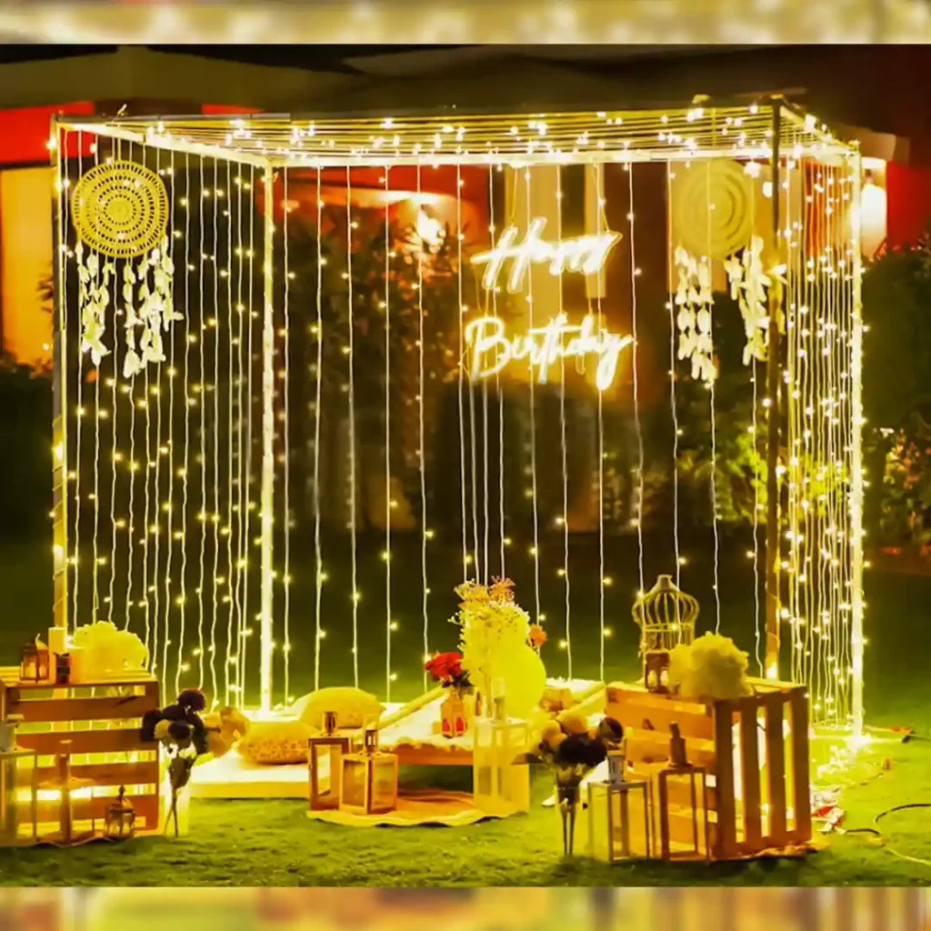 Family celebrating a birthday at a restaurant with decorated table, warm ambience, and staff assisting to create a joyful family-friendly dining experience.
